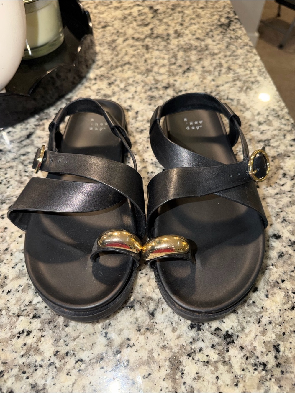 Black Leather Strap Sandals with Gold Accent